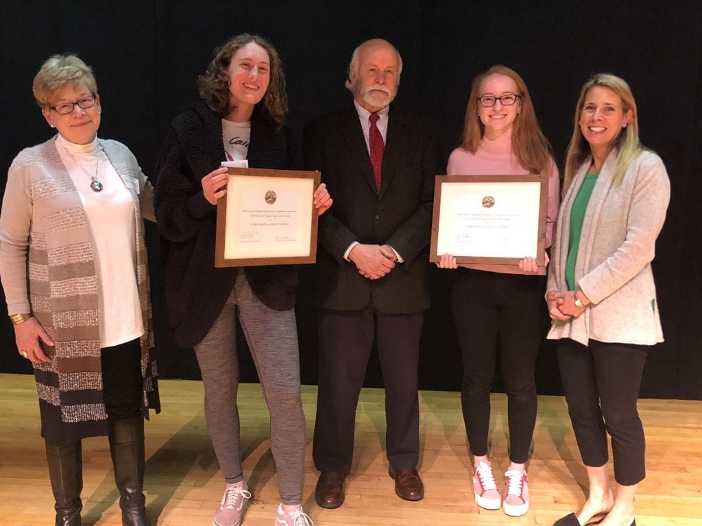 Left to right,  Historical Commission Administrator Andrea Young, essay contest winner Molly Schwall, Historical Commission member Jim Conroy, essay contest winner Claire Haney, and Historical Commission member Sarah Carolan    Not pictured because she took the photo:  Historical Commission member Signe McCullough.