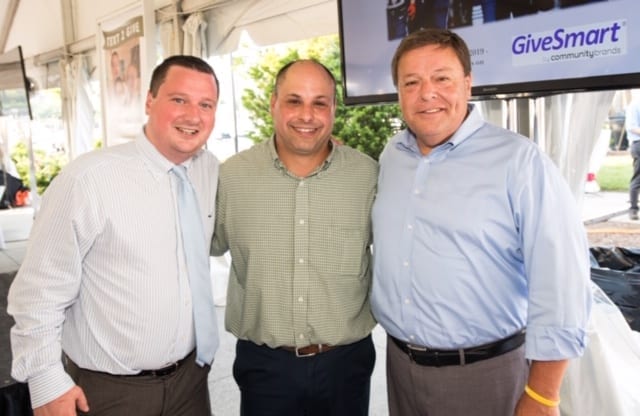 State Senator Patrick M. O’Connor, Father Bill’s & MainSpring President & CEO John Yazwinski, and Quincy Mayor Thomas Koch pictured at Father Bill’s & MainSpring’s 25th annual FoodFest fundraiser, held on Tuesday, July 30 at The Launch at Hingham Shipyard and Hingham Beer Works.
