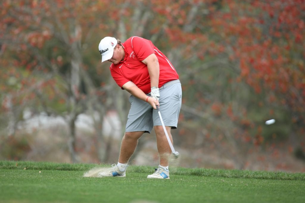 Jake WIlson tees off on the Par 3 second hole during his match with Silver Lake. 