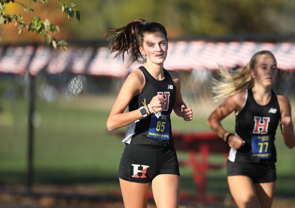 Senior Captain Callie Daly running hard on her second loop of the course.  