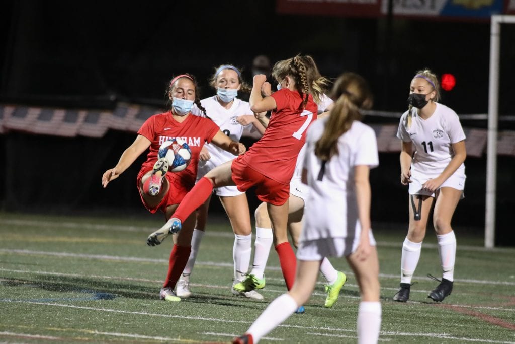 Junior Olivia Sharkansky battles for the position and the ball near WH's goal.