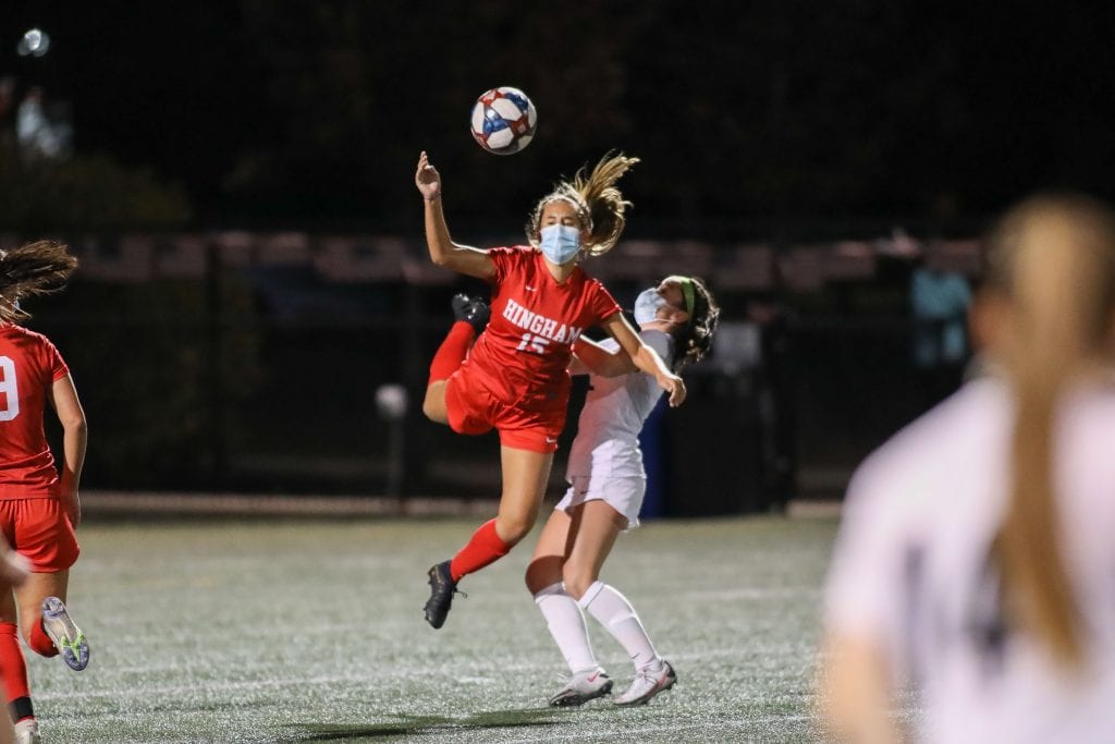 Alexa Varholak goes after a loose ball against a WH defender. 