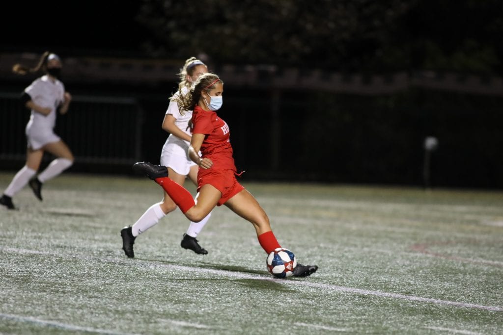 Junior captain Alexa Varholak scores the first goal of the game.