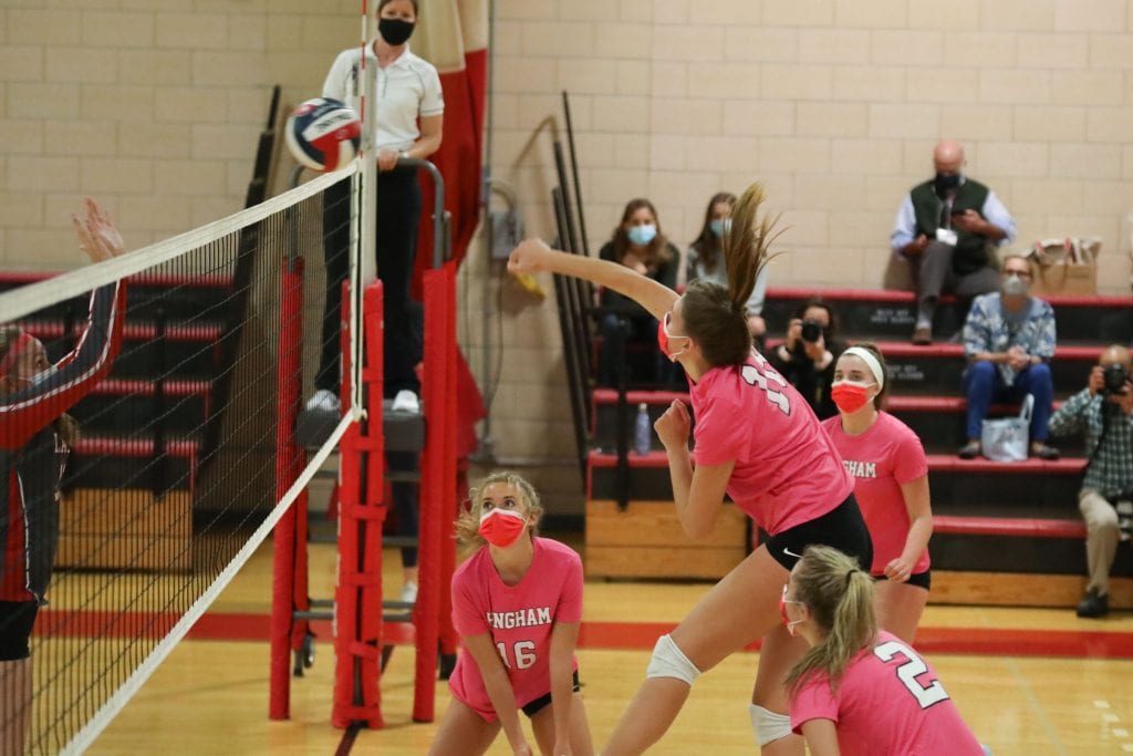 Junior Lilly Steiner spikes the ball for a kill. 