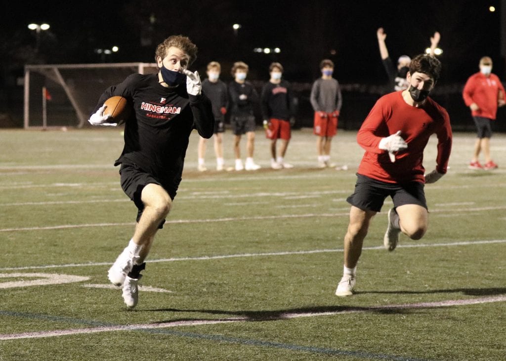 fullsizeoutput_9290 Cooper Estes running down the sideline during the Harbormen's 7v7 showcase.