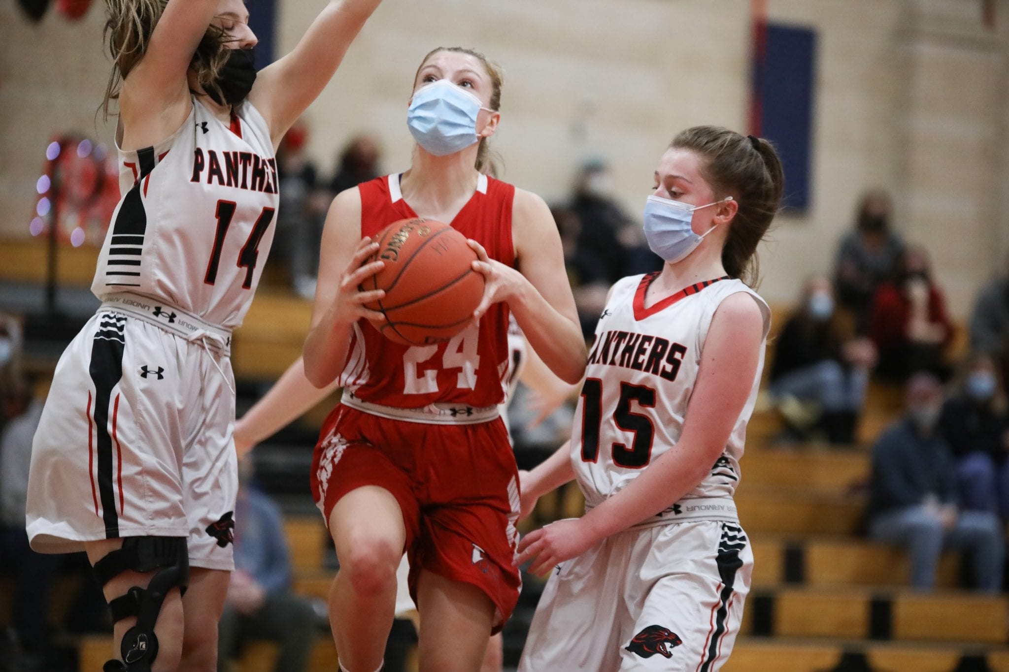 Junior captain Perry Blasetti driving to the basket in Hingham's loss against Whitman-Hanson.