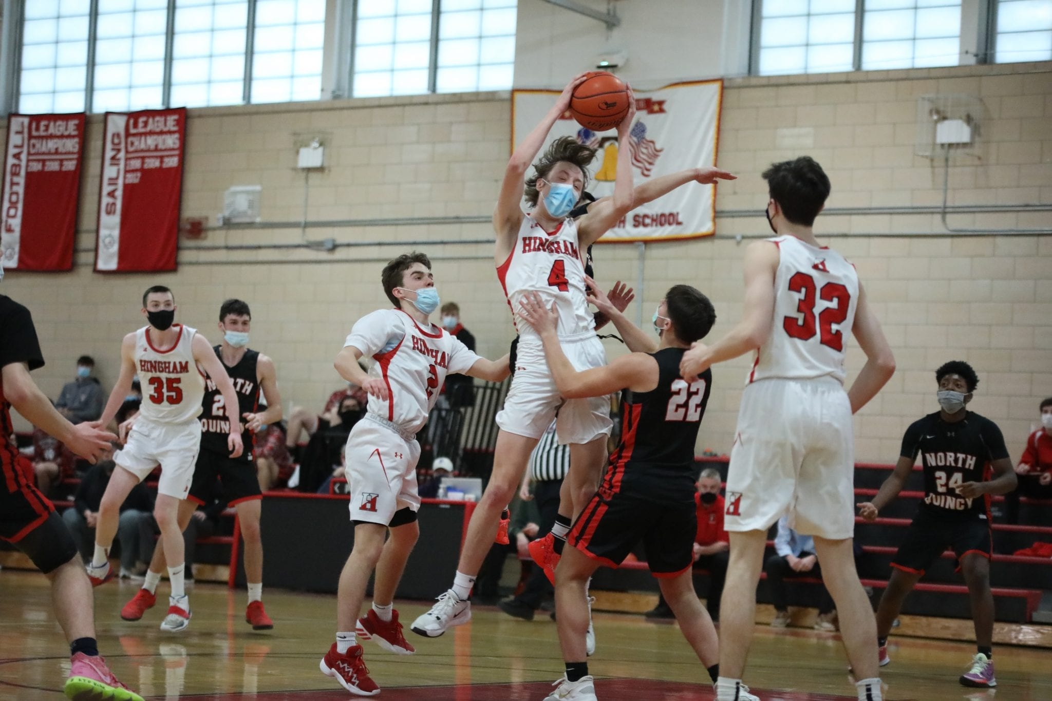 Junior Nick Johannes, who had a big night on both ends of the floor, grabs this rebound.  