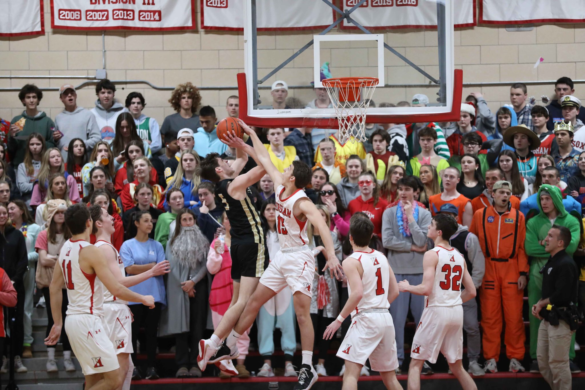 Junior Eddie Rochte with a big block in the second half of Hingham's opening round playoff game.