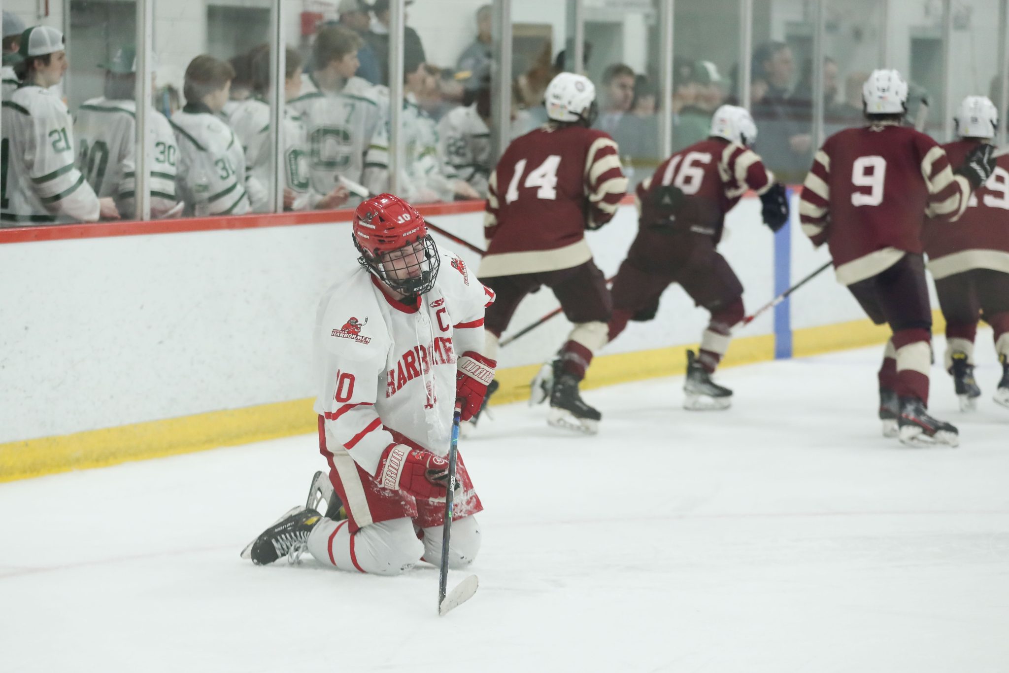 Senior captain Drew Carleton with the realization that the Harbormen's season is over after an empty netter by Arlington.  