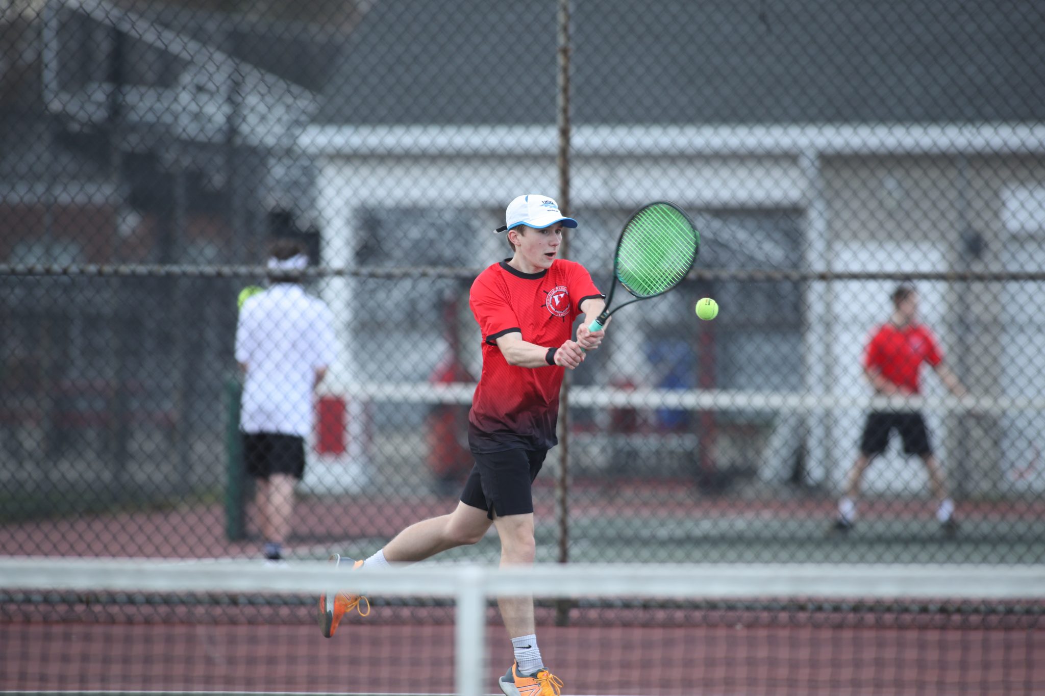 Junior Thomas Fabrizio returns a server in his match against Plymouth South. 