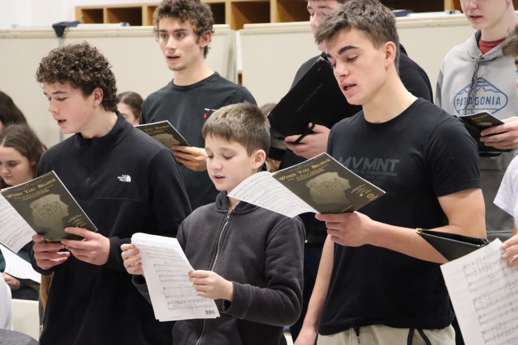 Middle School chorus students share an authentic high school